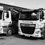 Durkan & Sons DAF Grab Wagon and Beavertail truck parked at the depot, branded civil engineering vehicles