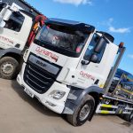 Durkan & Sons DAF CF Beavertail truck with vehicle loaded, next to Grab Wagon at company depot