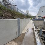 Precast concrete retaining wall installation at Christeyns site in Bradford by Durkan & Sons