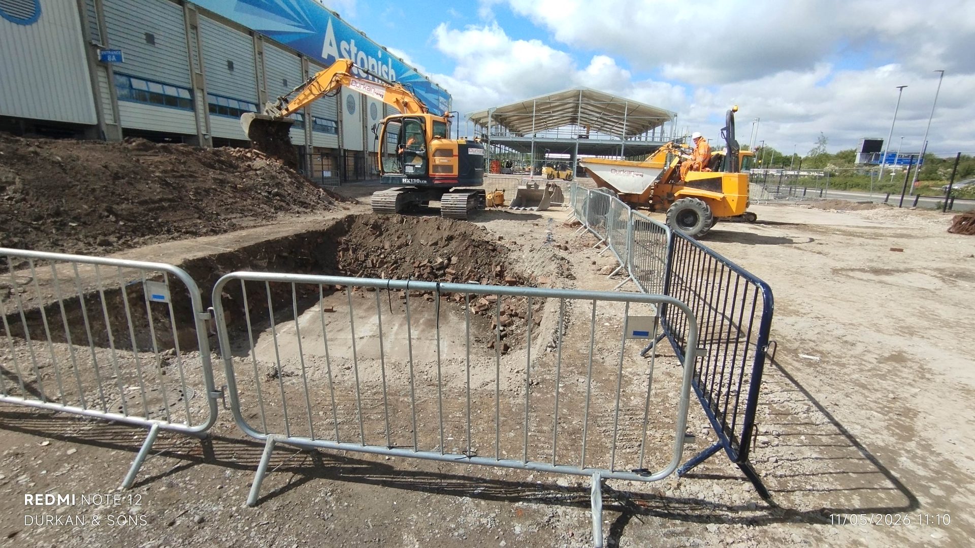 Excavators carrying out bulk earthworks at Elland Road Stadium during the West Stand enabling works