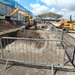 Excavators carrying out bulk earthworks and excavation at Elland Road Stadium during the West Stand Enabling Works